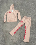Beige hoodie and pants set with red text 